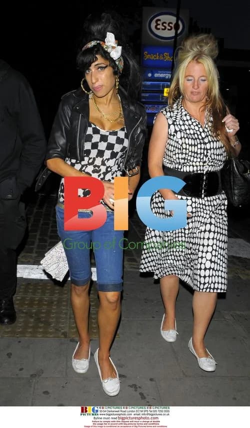 Amy Winehouse out with friend in London