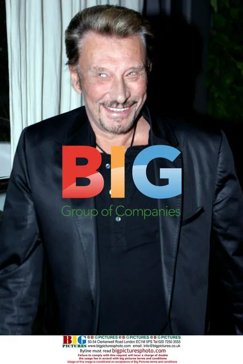 Johnny Hallyday and wife Laeticia at Sur restaurant