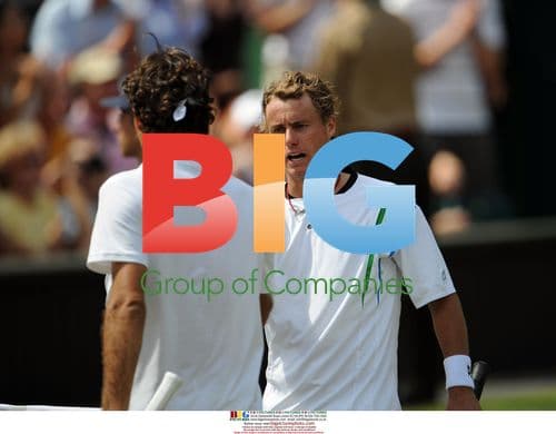 Roger Federer celebrates Wimbledon win