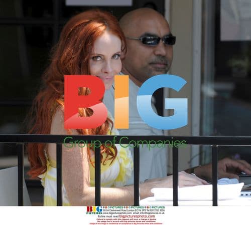 Phoebe Price Poses Outside LA Creperie