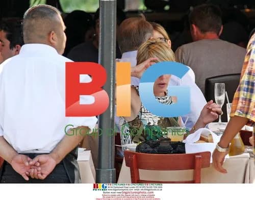 Actress Sharon Stone Takes Break During Lunch