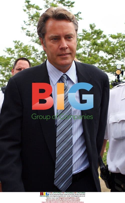 Peter Cook arrives for divorce trial