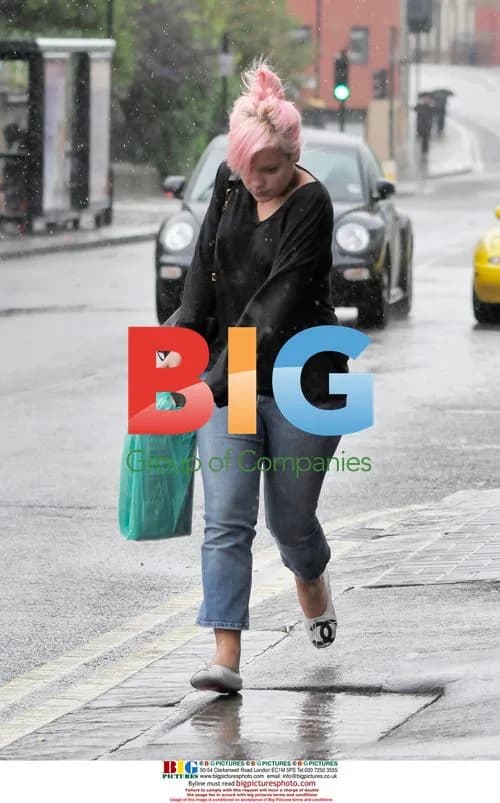 Lily Allen Braves Rain for Shopping in London