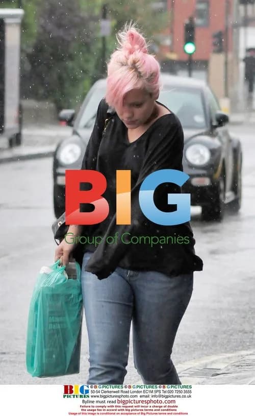 Lily Allen Braves Rain for Shopping Trip