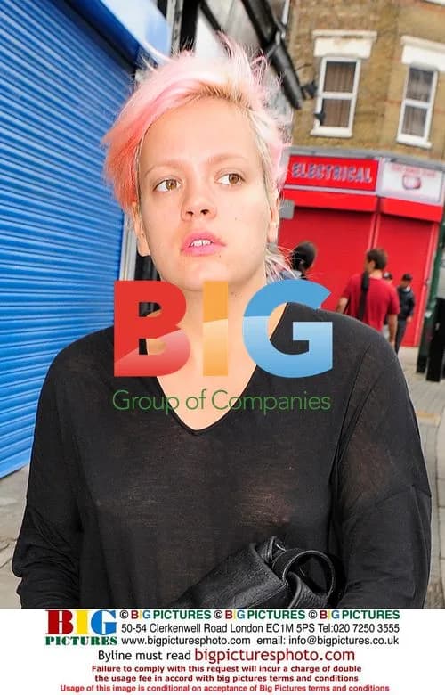 Lily Allen Braves the Rain for Shopping