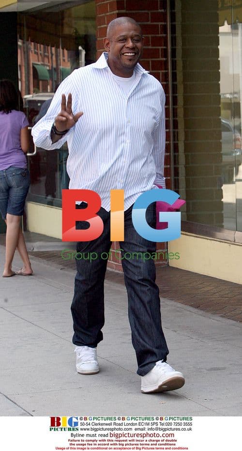 Forrest Whittaker and wife Keisha take a walk