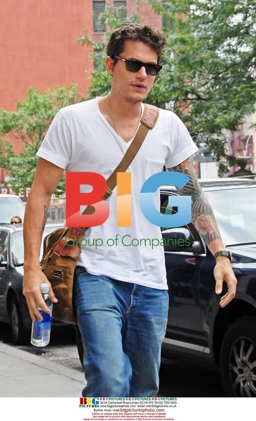 John Mayer Leaves NY Apartment
