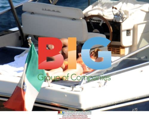 Patrice Evra and wife on holiday in Italy