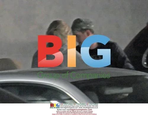 Michael Buble scoots around with mystery blonde