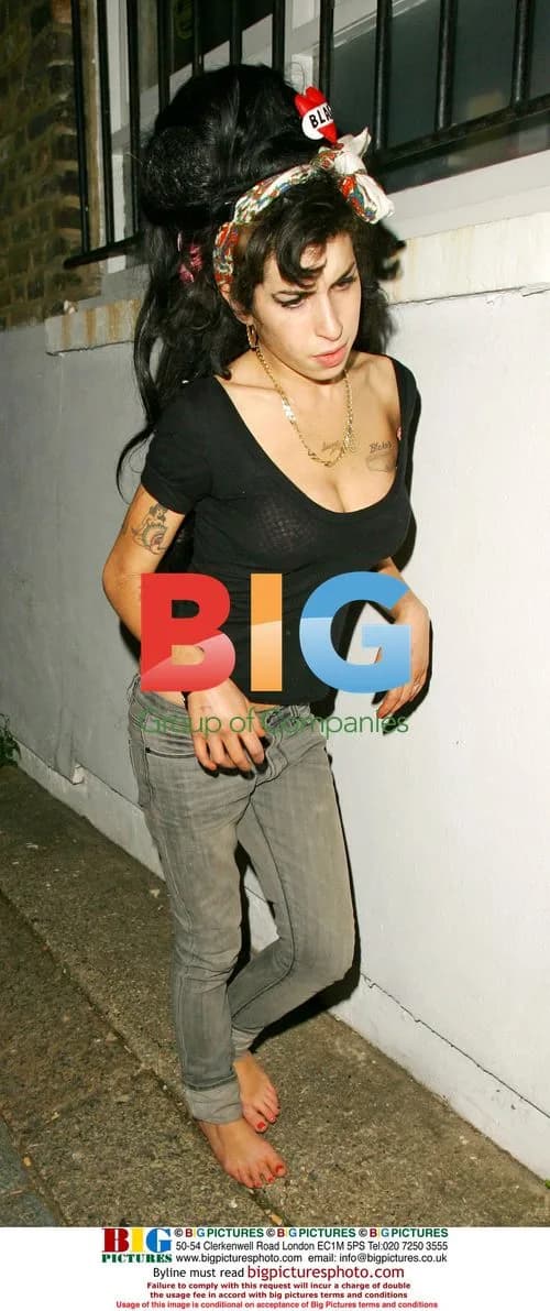 Amy Winehouse Returns Home Barefoot at 3:30 AM