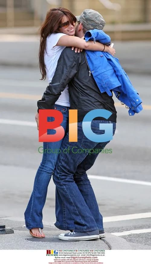 Michael Buble scoots around with mystery girl