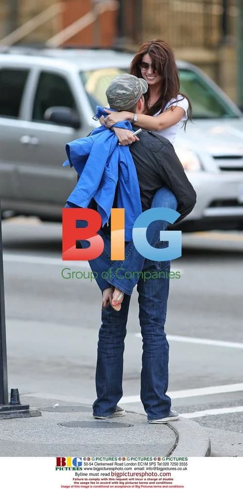 Michael Buble scoots around with mystery girl