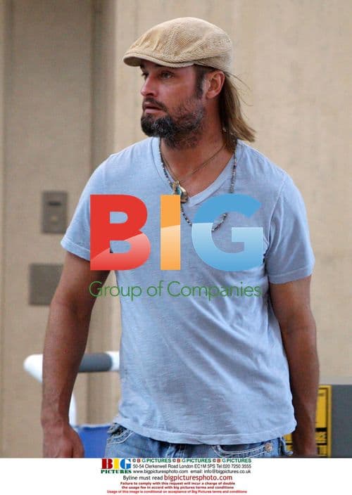 Josh Holloway departs LAX with wife