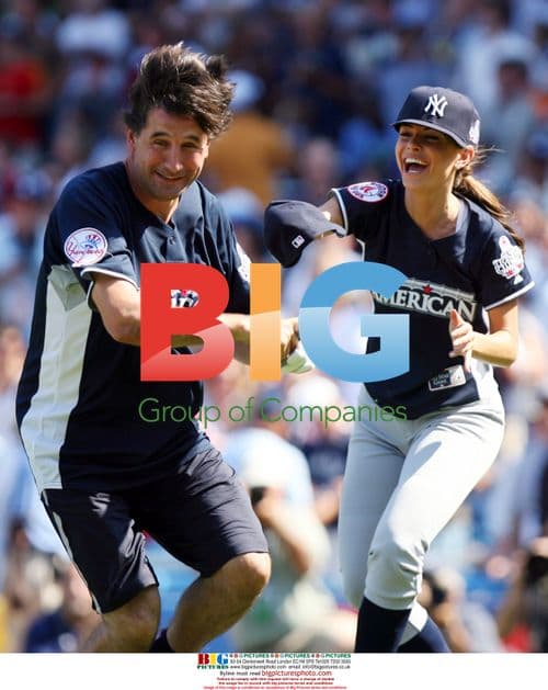 Maria Menounos chases Billy Baldwin at celebrity softball game
