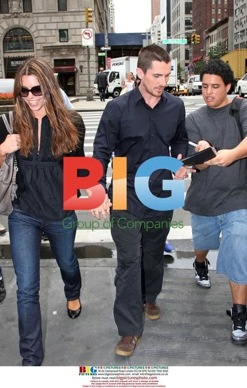 Christian Bale and wife mobbed by fans