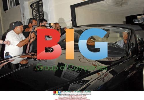 David and Victoria Beckham Leave Restaurant