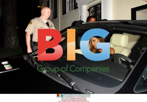 David and Victoria Beckham Leave Restaurant