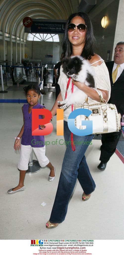Kimora Lee Departs LAX With Daughters