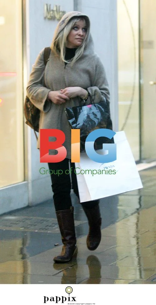 Ronnie Wood, Jo Wood and son Jesse shopping in London