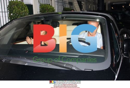 David and Victoria Beckham leave restaurant