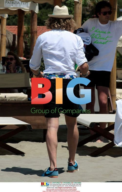 Lapo Elkaan relaxing on the beach