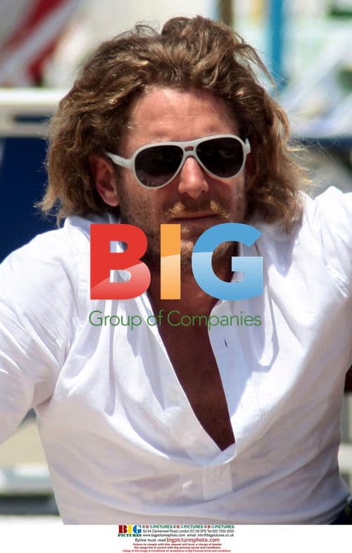 Lapo Elkann on the beach in Italy