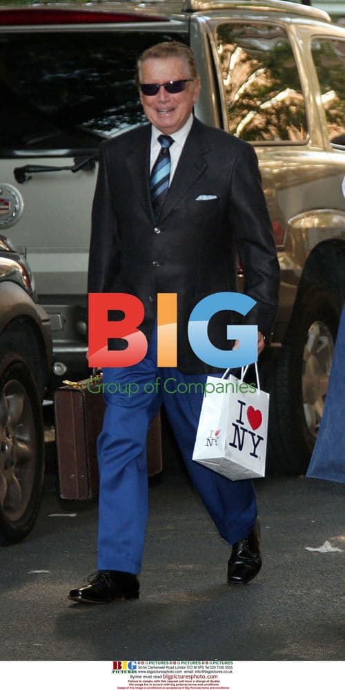 Regis Philbin walks to 'Live with Regis and Kelly' in NYC
