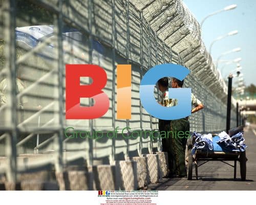 Chinese soldiers inspect Olympic fence in Beijing