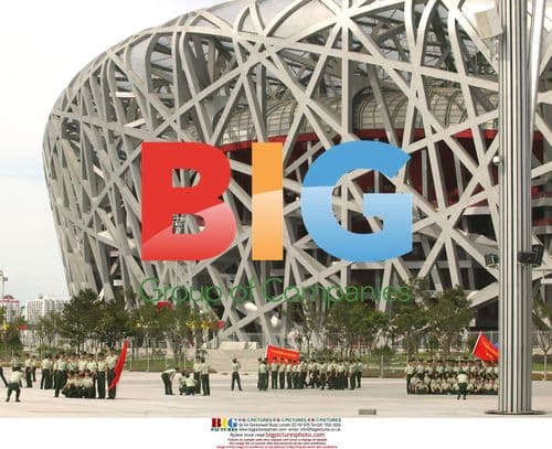 Chinese soldiers pose at Beijing's Bird's Nest