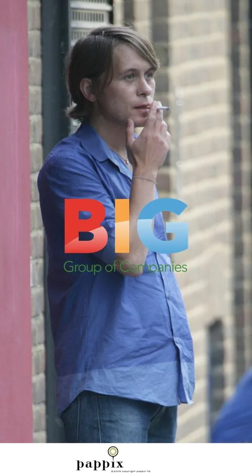 Mark Owen Takes Smoking Break in London