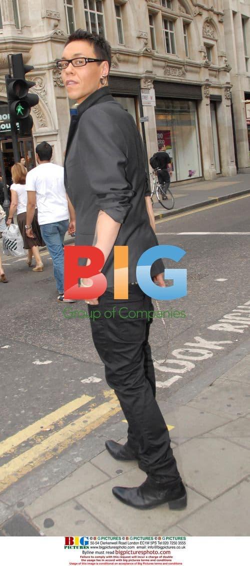 Gok Wan strolls with friend in London