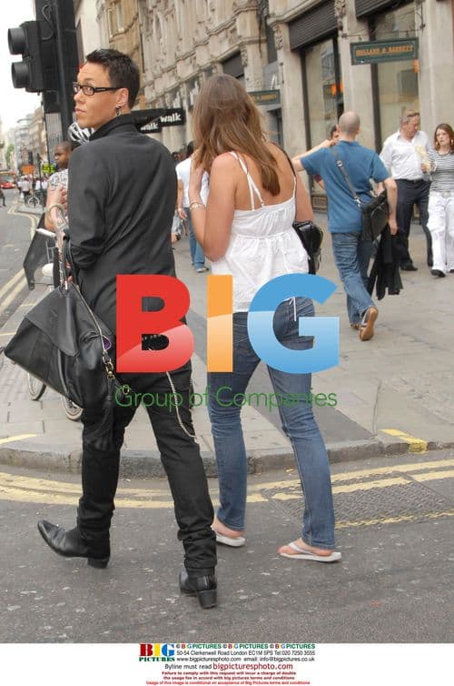 Gok Wan strolls with friend in London