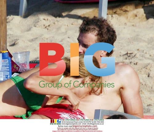 Jens Lehmann relaxing with family on beach