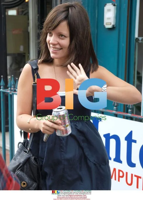 Lily Allen out with friend and dog in London