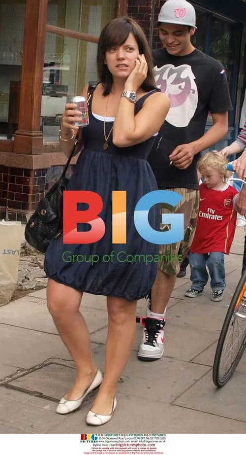 Singer Lily Allen out with friend and dog in London