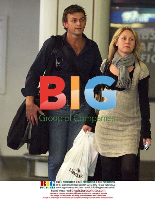 Adam Gilchrist and Wife Arrive at Perth Airport