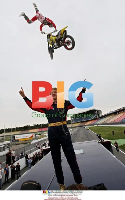 Busty Wolter jumps over Sebastian Vettel during X-Fighters Demo