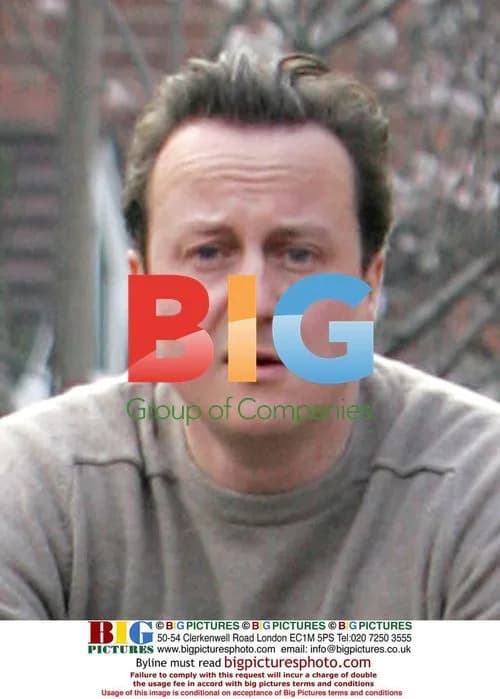 David Cameron cycling to work without helmet