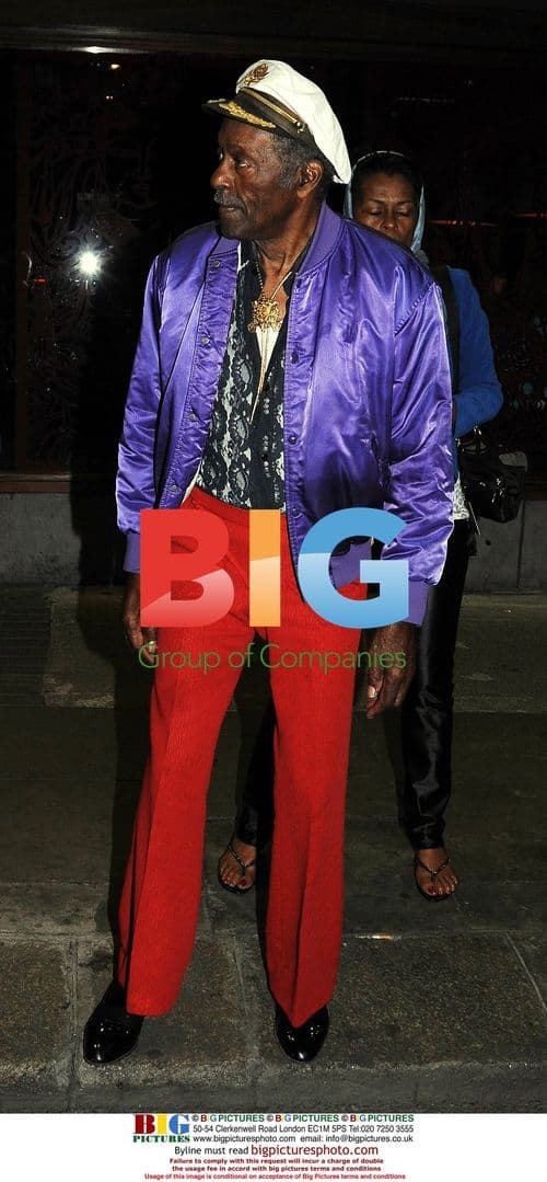 Chuck Berry leaving Dublin restaurant after show