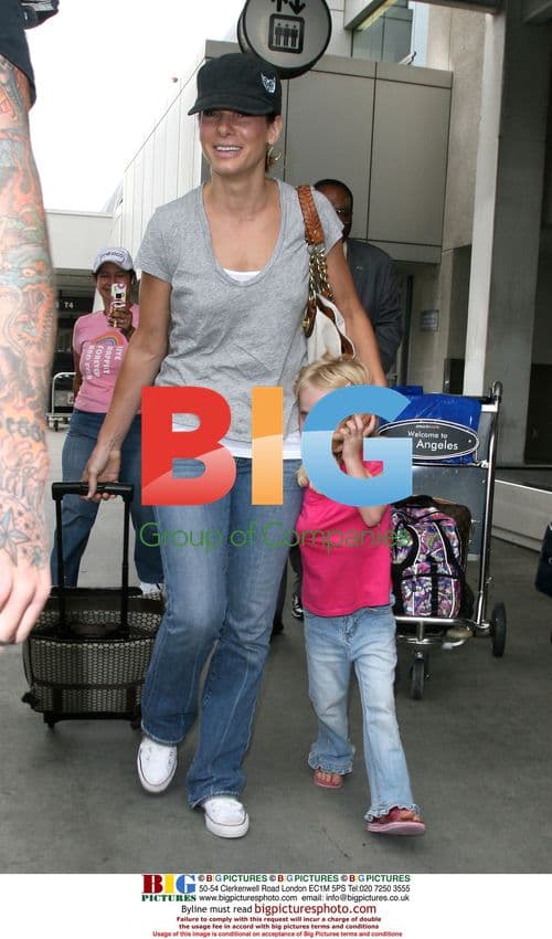 Sandra Bullock and Jesse James at LAX