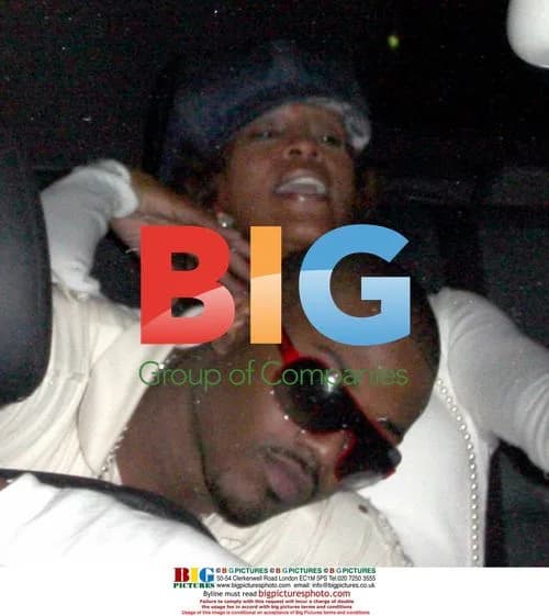 Whitney Houston and Ray J. Norwood leaving cafe