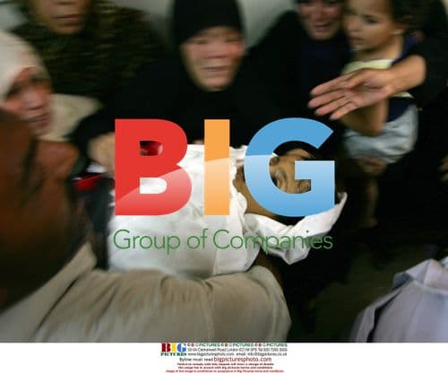 Palestinian relatives carry child's body in Gaza funeral