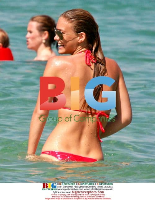 Bar Refaeli on beach holiday