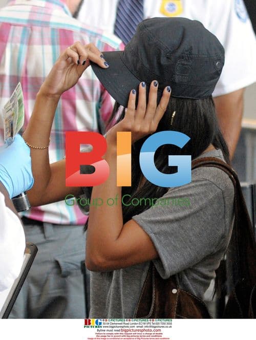 Vanessa Hudgens with family at LAX