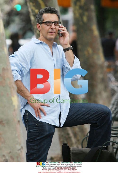 John Turturro on cell phone in NYC