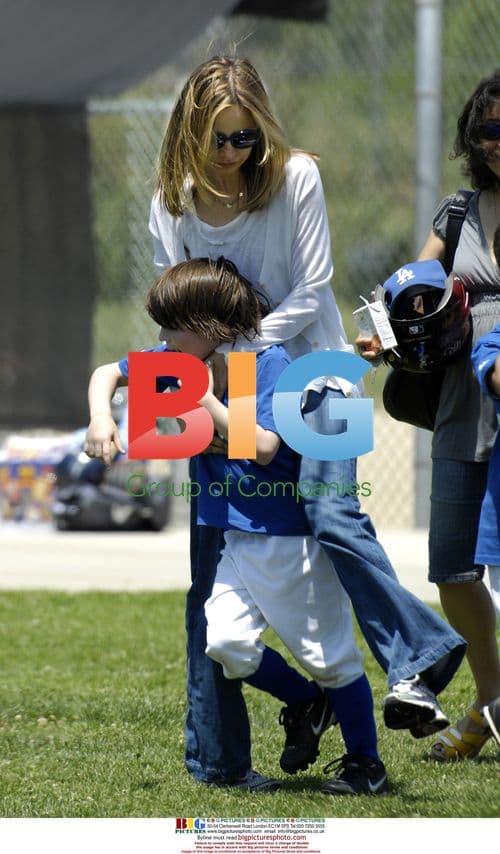 Harrison Ford and Calista Flockhart watch son Liam
