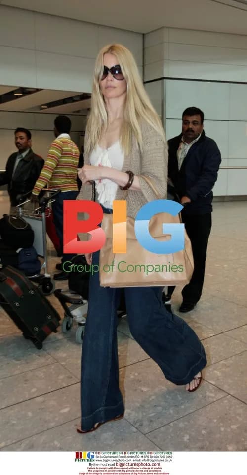 Claudia Schiffer arrives at Heathrow