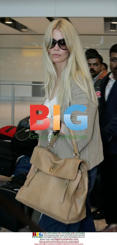 Claudia Schiffer arrives at Heathrow Airport