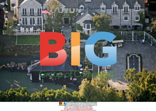 Tom Cruise and Katie Holmes Host Housewarming