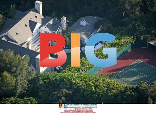 Tom Cruise and Katie Holmes host housewarming